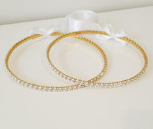 Load image into Gallery viewer, Evelyn (Gold) Stefana tied together with white satin ribbon.  Striking crystals with 3mm white pearls in a thick double row design on a Gold plated band.