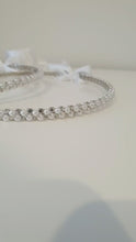 Load and play video in Gallery viewer, Evelyn (Silver) traditional Stefana Wedding Crowns made from elegant crystals paired with 3mm white pearls on a silver plated band and joined with satin white ribbon.
