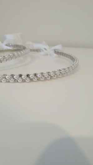 Evelyn (Silver) traditional Stefana Wedding Crowns made from elegant crystals paired with 3mm white pearls on a silver plated band and joined with satin white ribbon.