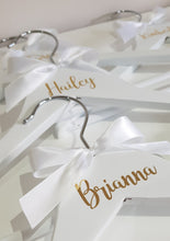 Load image into Gallery viewer, White Wooden Coat Hangers with Gold Name and White Bow
