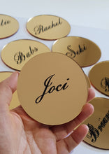 Load image into Gallery viewer, Gold Round Acrylic Place Card Coasters with Black Names
