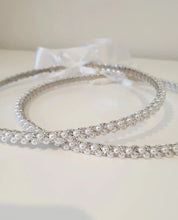 Load image into Gallery viewer, Evelyn (Silver) traditional Stefana Wedding Crowns made from elegant crystals paired with 3mm white pearls on a silver plated band and joined with satin white ribbon.
