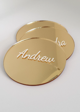 Load image into Gallery viewer, Gold Round Acrylic Place Card Coasters with White Names
