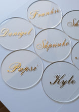 Load image into Gallery viewer, Clear Round Acrylic Place Card Coasters with Gold Names
